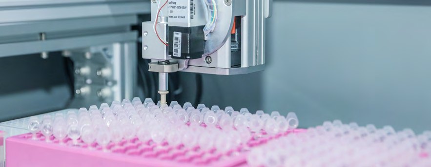 Automated oligo synthesis workstation in the gene factory (photo)